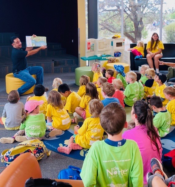 Children at summer camp and parents in a wellness facility